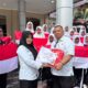 Sambut HUT Ke-81 RI, Pemkab Nagan Raya Bagikan 3.000 Bendera Merah Putih