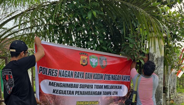 SATRESKRIM POLRES NAGAN RAYA PASANG SPANDUK HIMBAUAN, CEGAH AKTIVITAS PENAMBANGAN TANPA IZIN